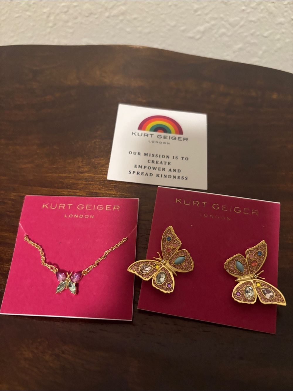 Kurt Geiger Gold Butterfly Necklace and Earrings Set in Pink
